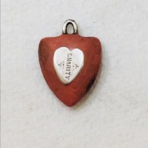 Small sterling charity charm.